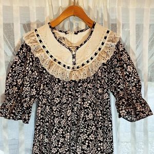 Vintage RM muumuu size 8. Fits more like a 6/7. Black and white.